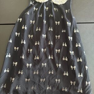 Black Dress with Silver Bow Accents